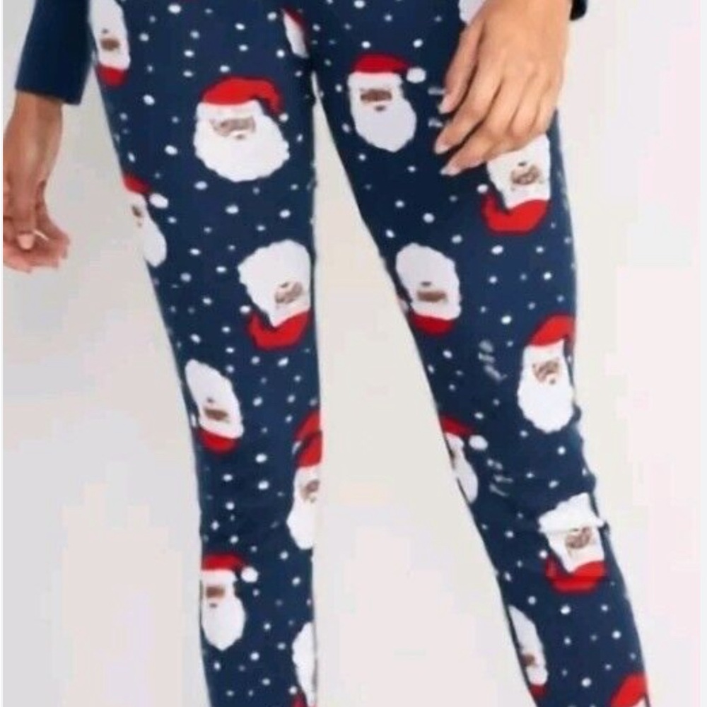 Two pairs holiday pajama bottoms